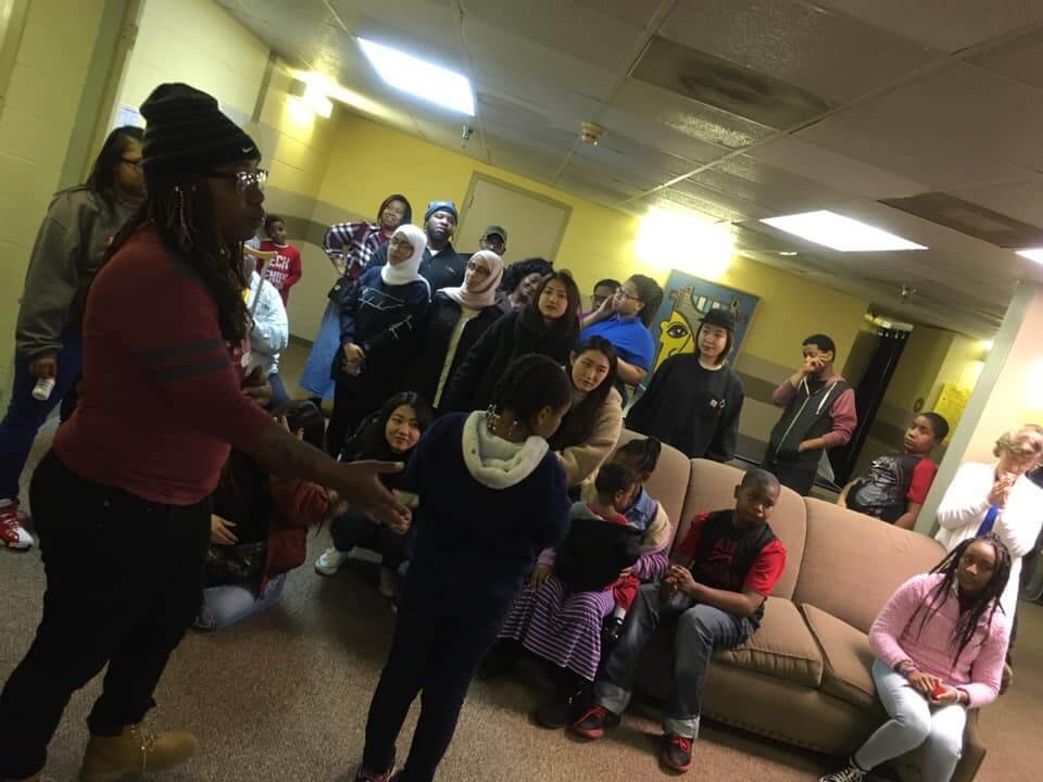 the Martin Enrichment Academy kids gathered in a group and standing