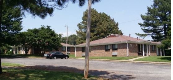 Wide street view of Northwest Apartments