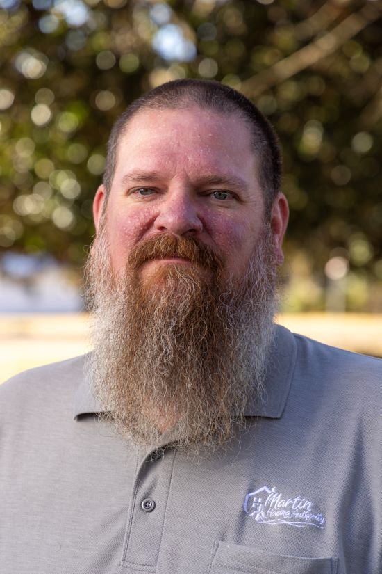 Ben West gives a small smile for his headshot.