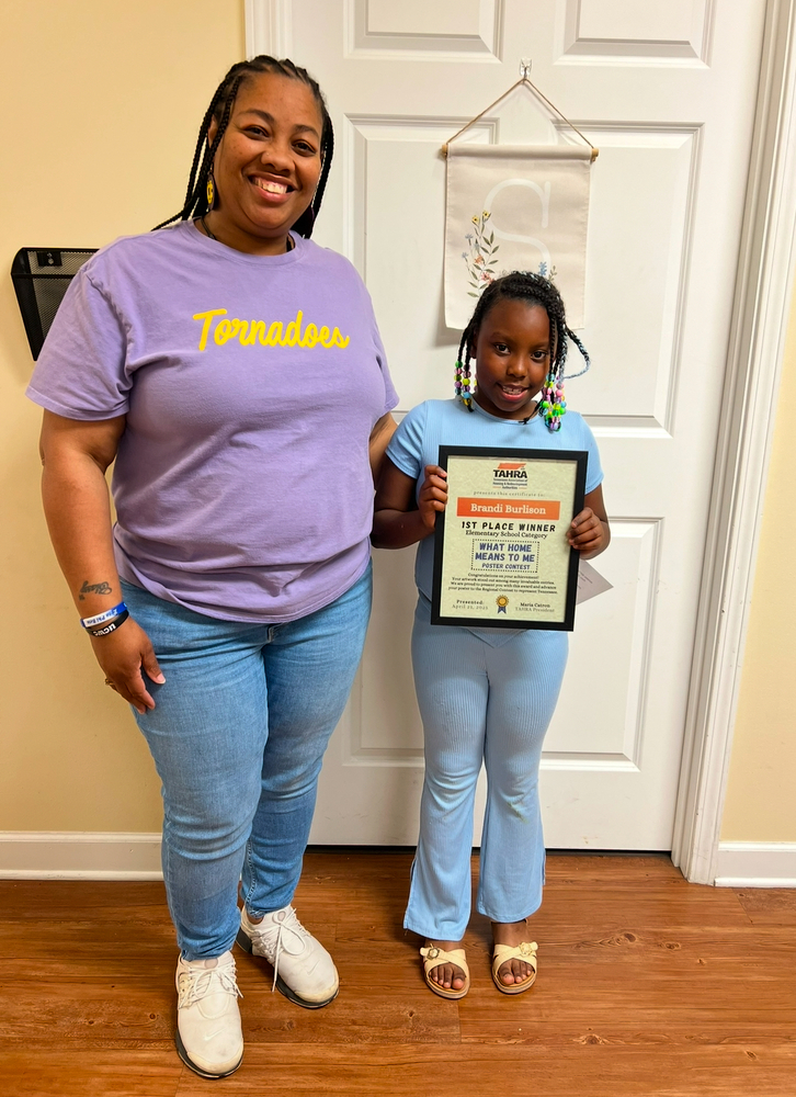 Photo with poster contest winner