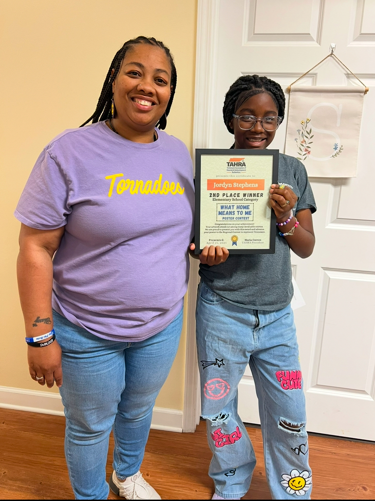 Photo with poster contest winner